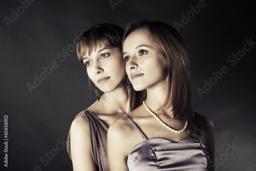 Photo: Two young happy fashion women Two young happy fashion women