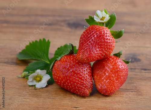 Photo: Strawberries in red heart shape bowl Strawberries in red heart shape bowl
