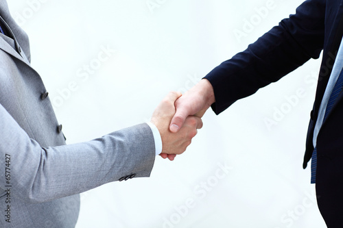 Photo: Closeup of a business handshake Closeup of a business handshake