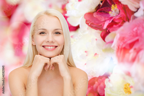 Photo: smiling young woman smiling young woman