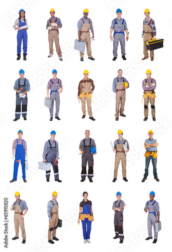 Photo: Confident Multiethnic Engineers Against White Background Confident Multiethnic Engineers Against White Background