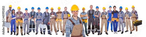 Photo: Construction Worker With Colleagues Over White Background Construction Worker With Colleagues Over White Background