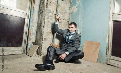 Photo: Arrested man with handcuffed hand Arrested man with handcuffed hand