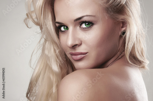 Photo: Beautiful blond woman.hairstyle.salon care.sexy young girl Beautiful blond woman.hairstyle.salon care.sexy young girl