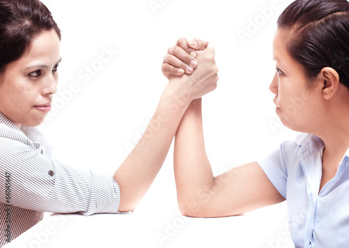 Photo: Two office staffs involved in power struggle. Two office staffs involved in power struggle.