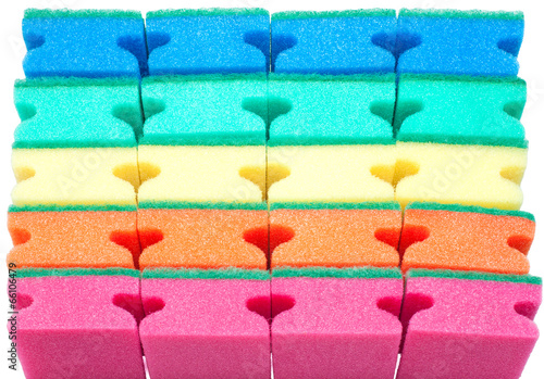 Photo: Background of colorful sponges isolated Background of colorful sponges isolated