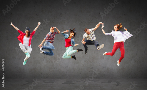  group of teenagers jumping