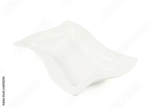 Photo: White ceramic plate isolated White ceramic plate isolated