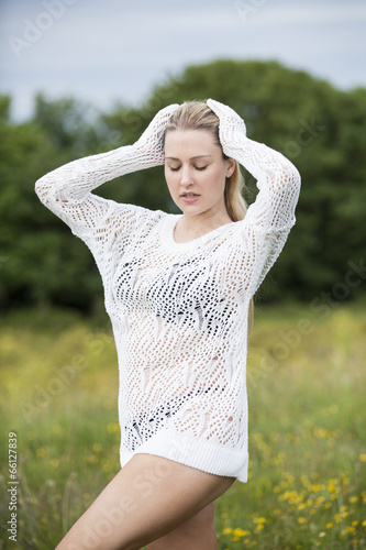 Photo: girl in field in glamour pose girl in field in glamour pose