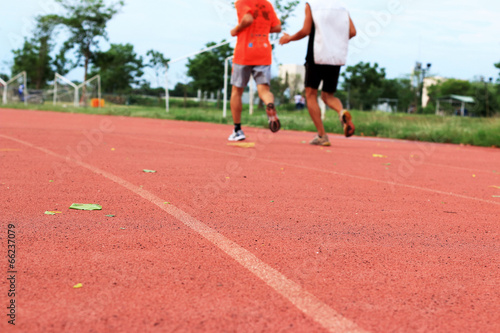 Photo: running jogging on sport track running jogging on sport track