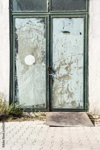 Photo: Dirty old shop door Dirty old shop door
