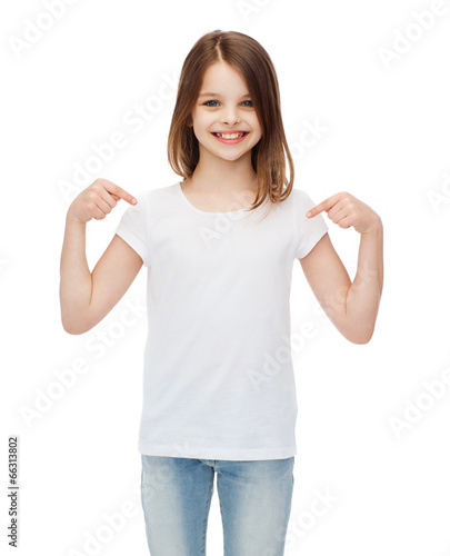 Photo: smiling little girl in blank white t-shirt smiling little girl in blank white t-shirt