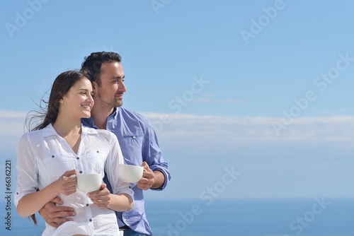 Photo: happy young romantic couple have fun relax happy young romantic couple have fun relax