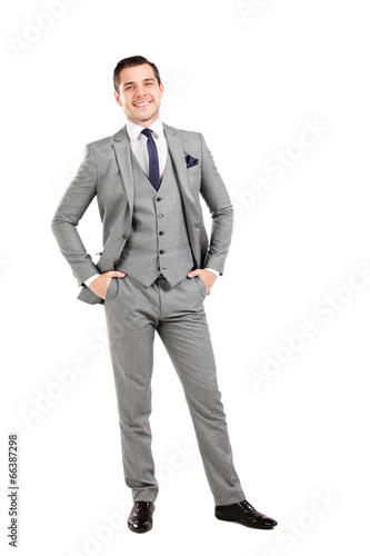 Photo: Portrait of a business man isolated on white background Portrait of a business man isolated on white background