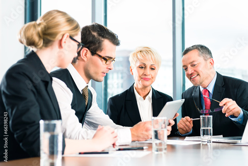 Photo: Business - meeting in office, people working with document Business - meeting in office, people working with document