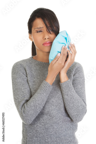 Photo: Woman is having toothache Woman is having toothache