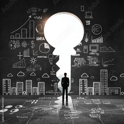 Photo: big key and drawing concept big key and drawing concept