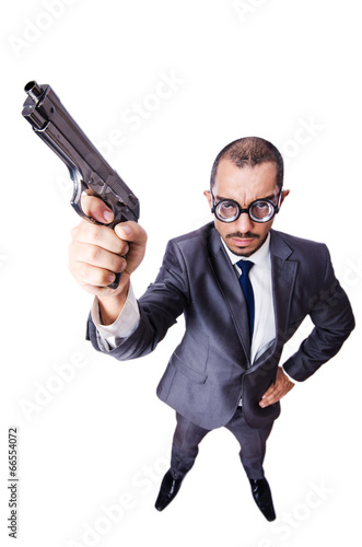Photo: Funny man with gun isolated on white Funny man with gun isolated on white