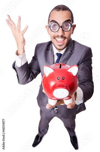 Photo: Funny man with piggybank on white Funny man with piggybank on white