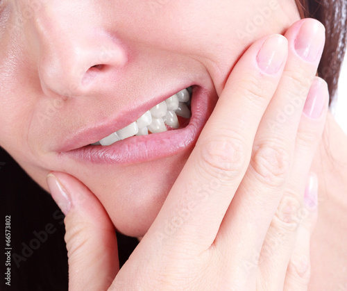 Photo: Woman with a tooth pain Woman with a tooth pain