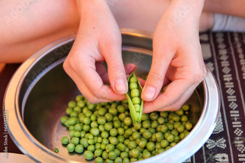 Photo: peeling peas peeling peas