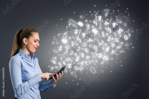 Photo: worried woman with calculator worried woman with calculator