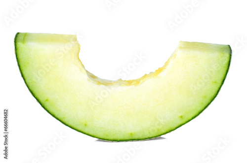 Photo: Sliced cantaloupe isolated on white background Sliced cantaloupe isolated on white background