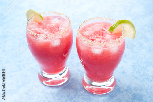 Photo: Two glasses of watermelon cocktail with brown sugar and lime Two glasses of watermelon cocktail with brown sugar and lime