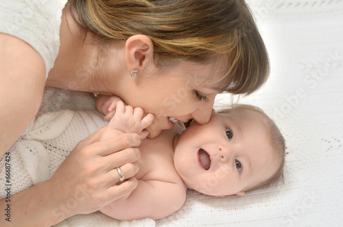 Photo: mother playing with baby mother playing with baby