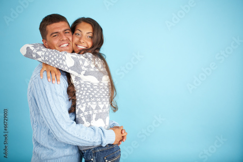 Photo: Couple in pullovers Couple in pullovers