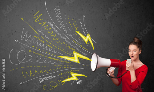 Photo: Cute girl shouting into megaphone with hand drawn lines and arro Cute girl shouting into megaphone with hand drawn lines and arro