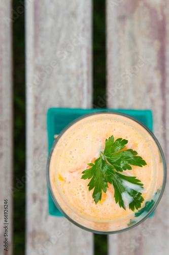 Photo: Carrot smoothie with fresh parsley leaves Carrot smoothie with fresh parsley leaves