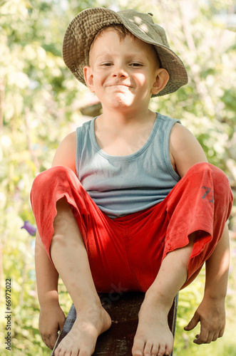 Photo: Cheeky young barefoot country boy Cheeky young barefoot country boy