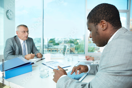 Photo: Working at meeting Working at meeting