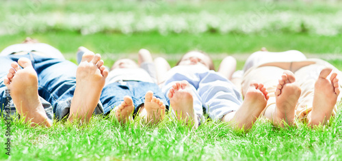 Photo: Family feet on grass Family feet on grass