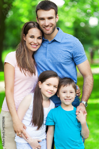Photo: Happy family of four Happy family of four