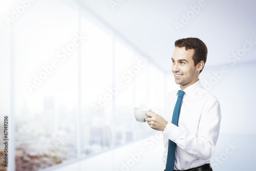 Photo: businessman with coffee businessman with coffee