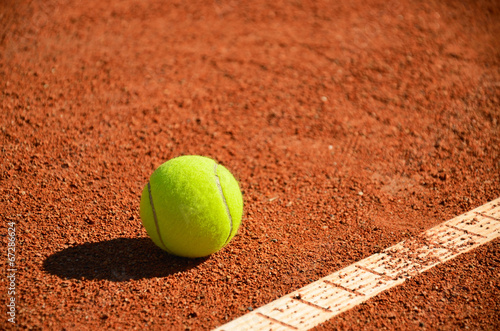 Photo: tennis ball near markup diagonal horizontal tennis ball near markup diagonal horizontal