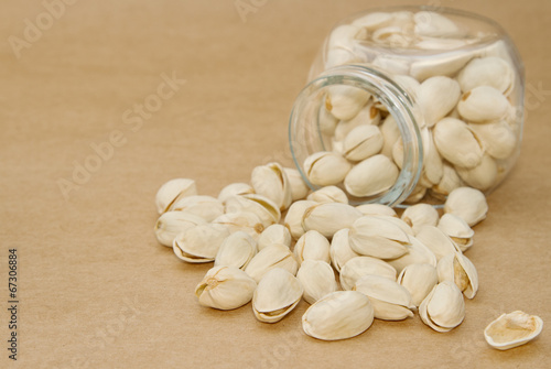 Photo: close up of a bottlel of pistachio nuts close up of a bottlel of pistachio nuts