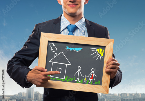 Photo: Businessman with frame Businessman with frame
