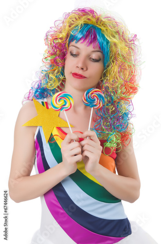 Photo: Pretty girl with lollypops isolated on white Pretty girl with lollypops isolated on white