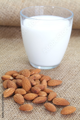 Photo: Almond milk in glass with almonds Almond milk in glass with almonds