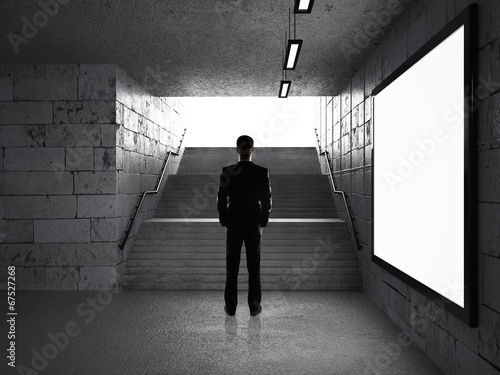 Photo: businessman in underground passage businessman in underground passage