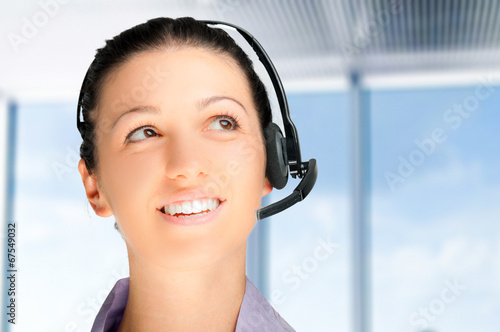 Photo: Portrait of a beautiful customer representative at work Portrait of a beautiful customer representative at work