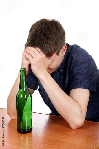 Photo: Sad Teenager in Alcohol Addiction Sad Teenager in Alcohol Addiction