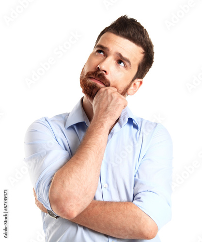 Photo: Thinking man isolated on white background Thinking man isolated on white background