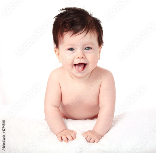 Photo: Beautiful expressive adorable happy cute laughing smiling baby Beautiful expressive adorable happy cute laughing smiling baby