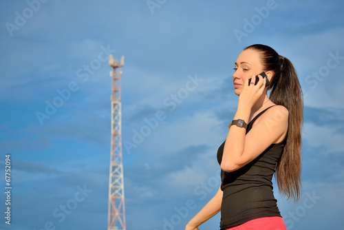 Photo: Woman talking on phone Woman talking on phone