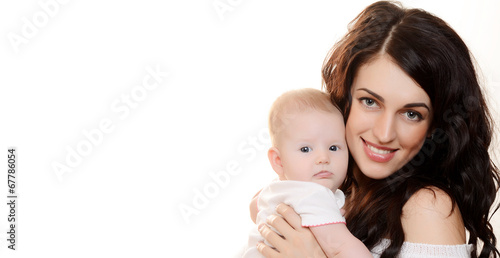 Photo: The happy mother with baby on white background The happy mother with baby on white background