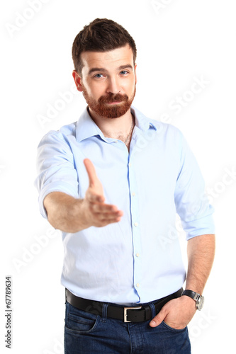 Photo: A business man with an open hand ready to seal a deal A business man with an open hand ready to seal a deal